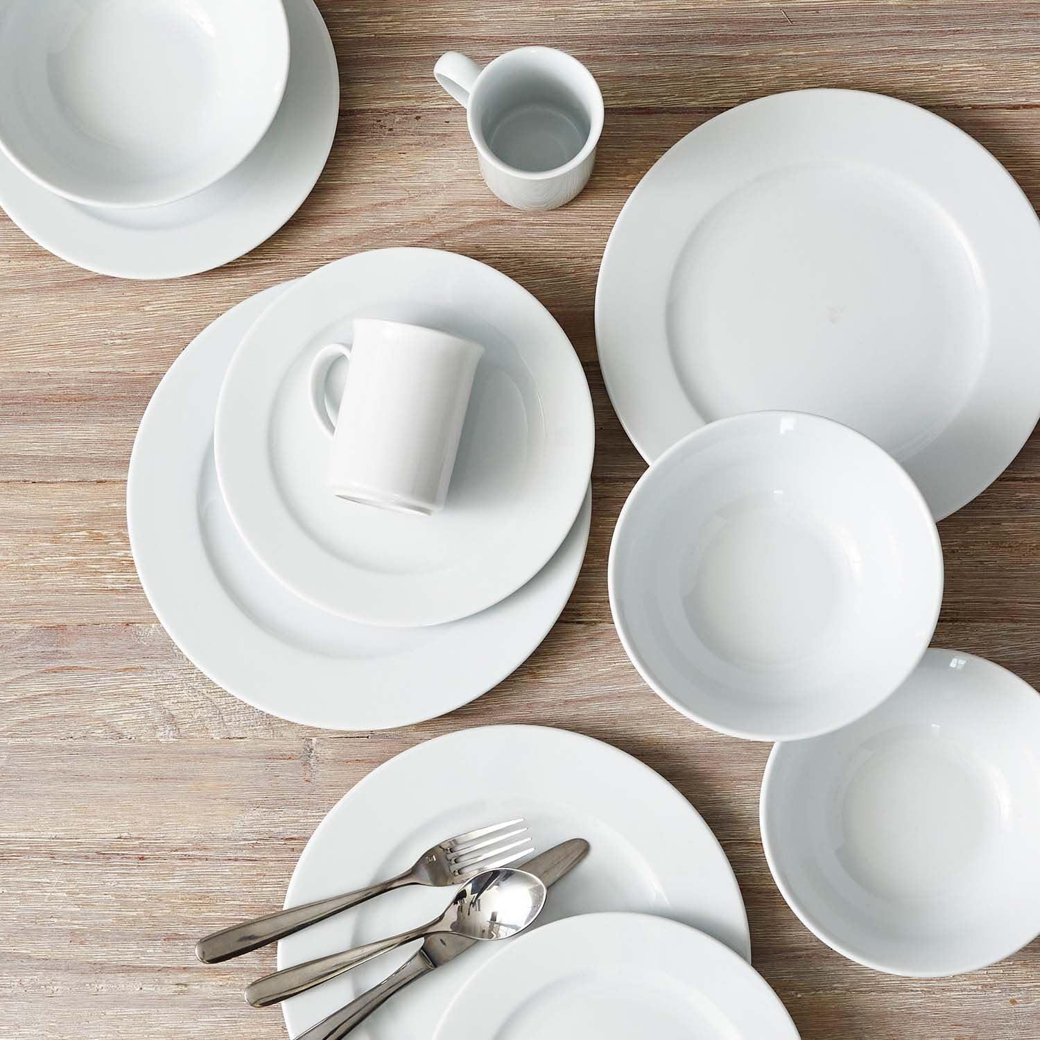 imageSur La Table Bistro 24 Piece Porcelain Dinnerware Set includes Dinner Plates Salad Plates Cereal Bowls and Mugs Service for 6 White Microwave and Dishwasher