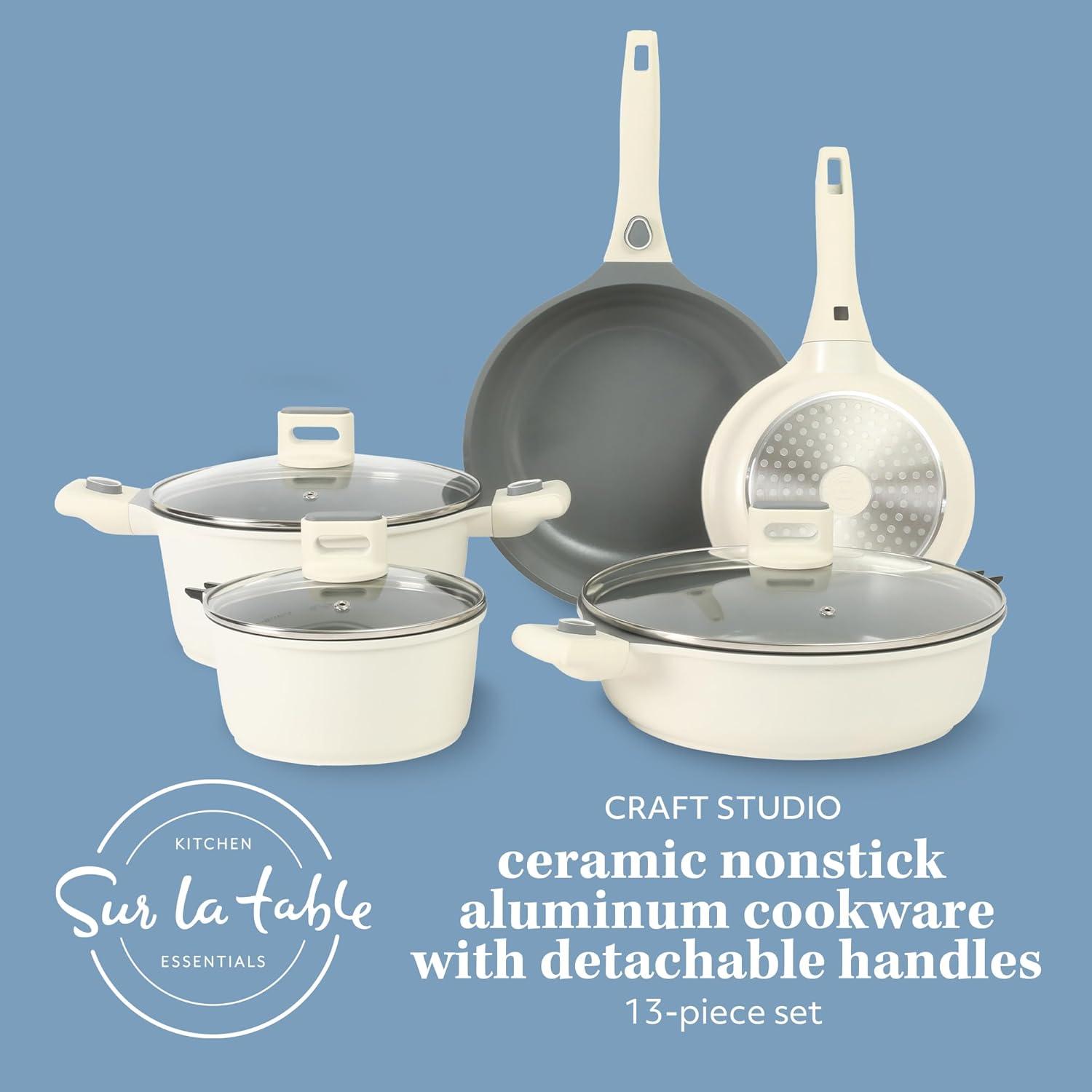 imageSur La Table Kitchen Essentials 13 Piece Detachable Handle Pots and Pans Premium PFA Free Premium Ceramic Non Stick Induction Safe and Secure Removable Handle Cookware Set Eggshell WhiteEggshell White
