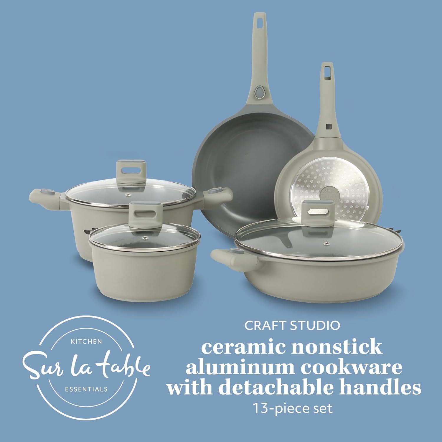 imageSur La Table Kitchen Essentials 13 Piece Detachable Handle Pots and Pans Premium PFA Free Premium Ceramic Non Stick Induction Safe and Secure Removable Handle Cookware Set Eggshell WhiteJuniper Green