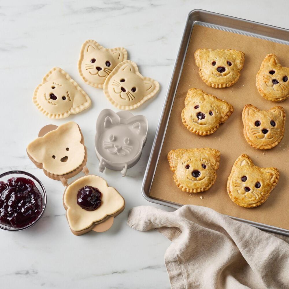 imageSur La Table Cat amp Dog Hand Pie Mold Set  2 Mini Molds with Hinged SelfCrimping Design for Sealed Pastry Baking Easy to Use Fun Shapes for Kids amp Pet Lovers 45 Size