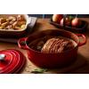 Le Creuset Enameled Cast Iron Signature Oval Dutch Oven, 9.5 qt., Cerise(Cerise)