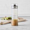 Sur La Table Salad Dressing Shaker – 18 oz Glass Bottle with Emulsifying Wand, Measurement Markings & Built-In Recipes – Mix Vinaigrettes & Caesar Dressings Easily