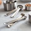 Sur La Table Stainless Steel Measuring Cups & Spoons Set – 8-Piece Kitchen Baking Tool Set with Nesting Design, Easy-Open Ring, Space-Saving Storage – Sizes from ¼ tsp to 1 cup