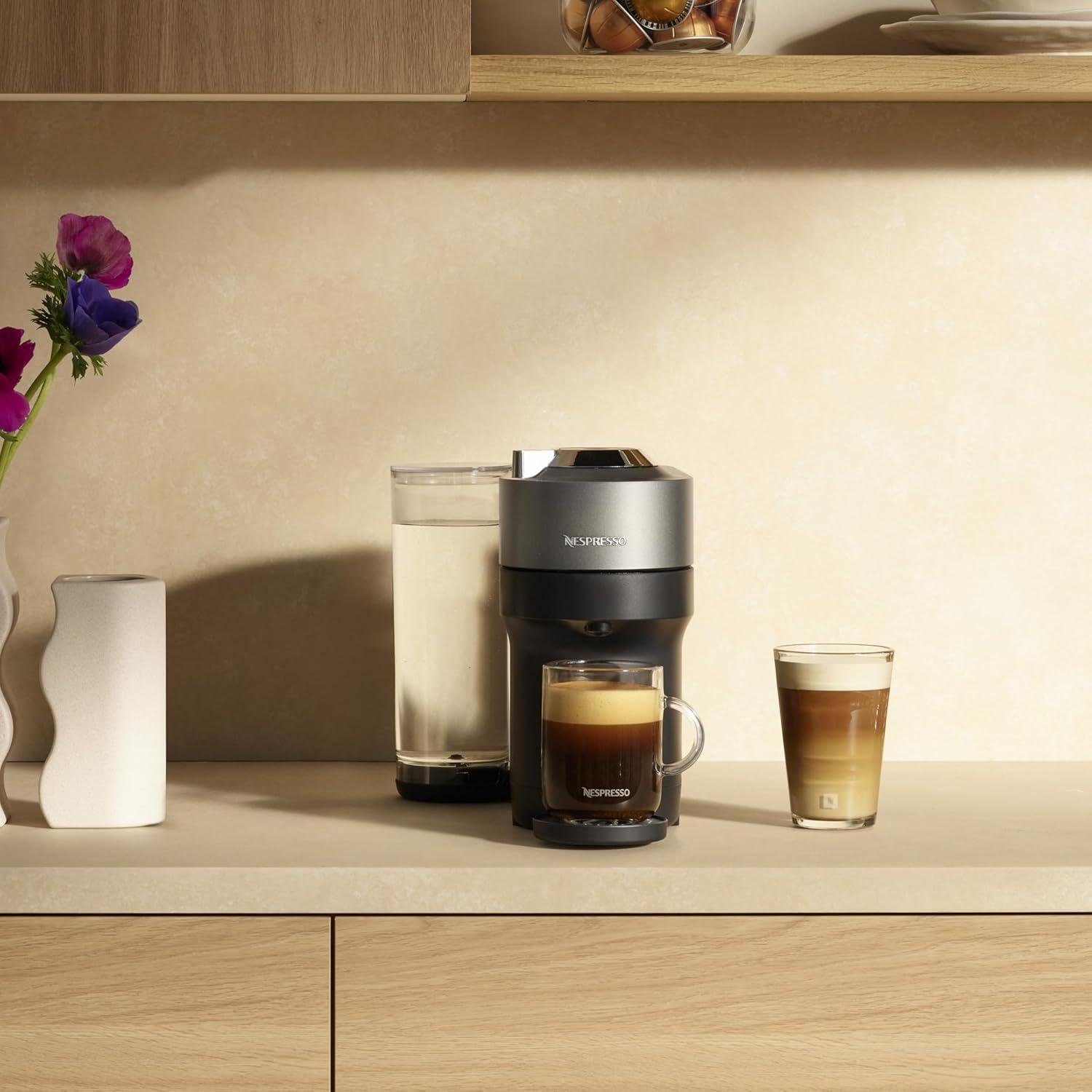 imageNespresso Festive Vertuo Pop Deluxe Coffee and Espresso Maker by Breville with Milk Frother Matte Black GoldTitan