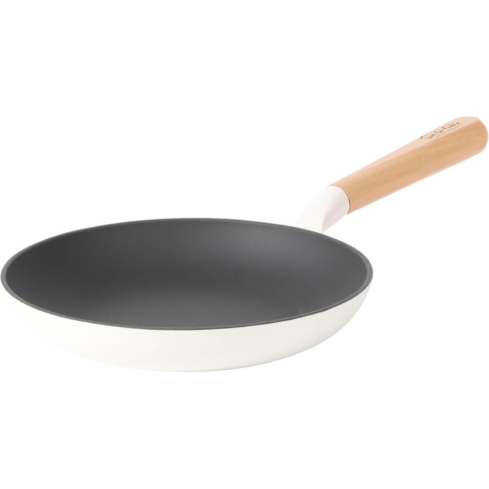 imageSur La Table Kitchen Essential Main Canteen 95 PreSeasoned Cast Iron Skillet wWood Handle Natural Nonstick Lightweight Frying Pan for Searing Sauting amp Everyday Cooking BlueEggshell White Skillet