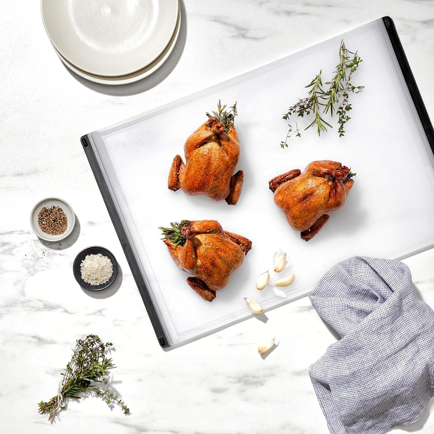 imageOXO Good Grips Plastic Utility Cutting BoardCarving Cutting Board