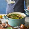 Sur La Table 5-Qt Enameled Cast Iron Dutch Oven – With Lid for Braising, Baking & Deep Frying, Induction Compatible, Oven to 500°F, Moisture-Retaining Design for Flavorful Results, Light Teal