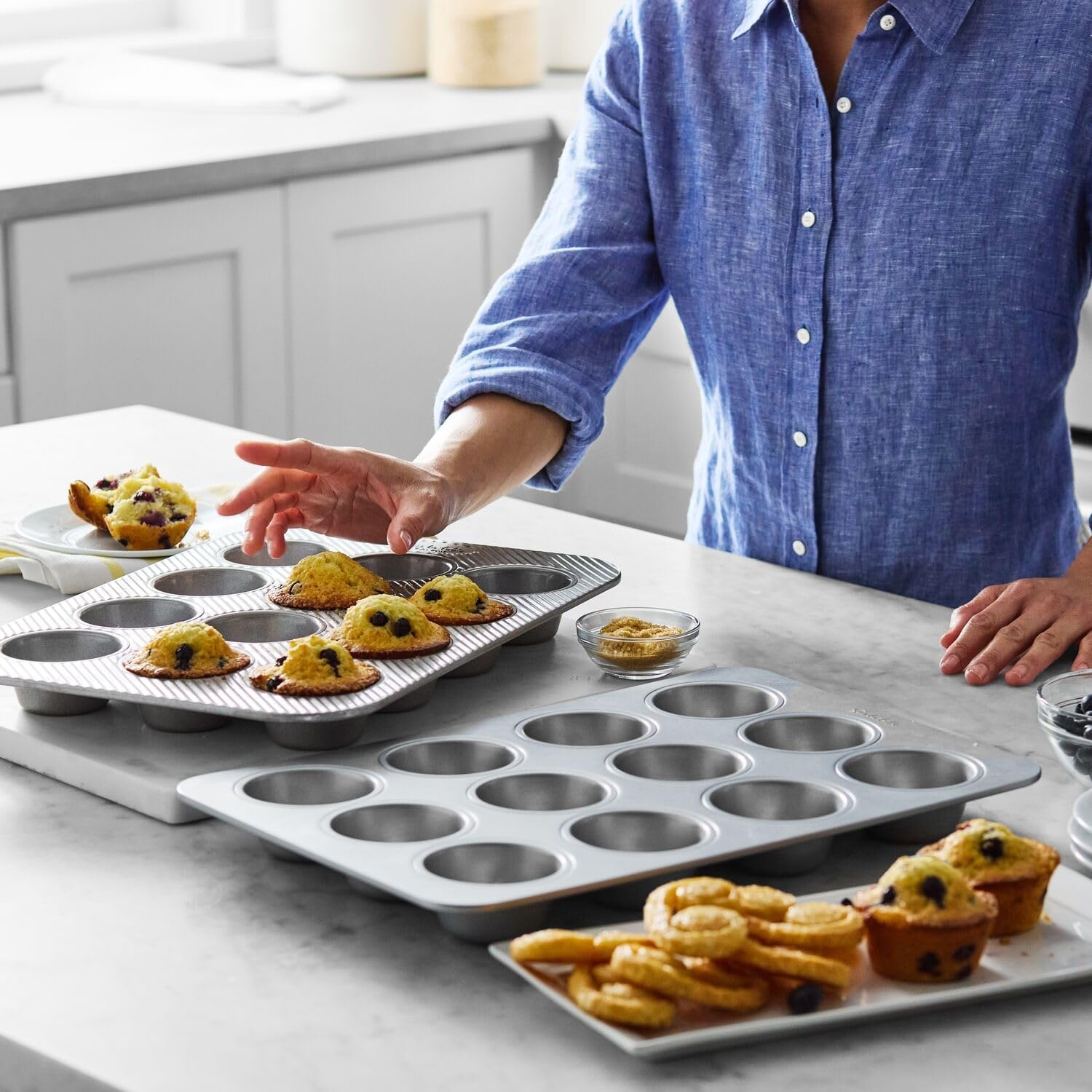 image:imageSur La Table Signature Muffin Pan Aluminized Steel Bakeware with Nonstick Coating for Even Rising and Easy Release 12 Count